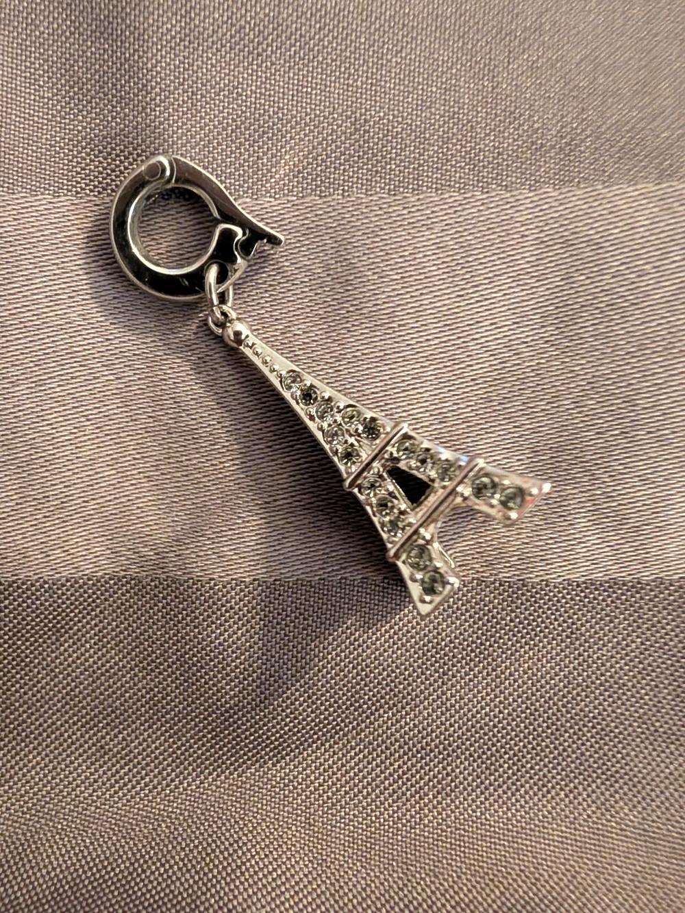 Swarovski Eiffel Tower clip charm  2 stones missing